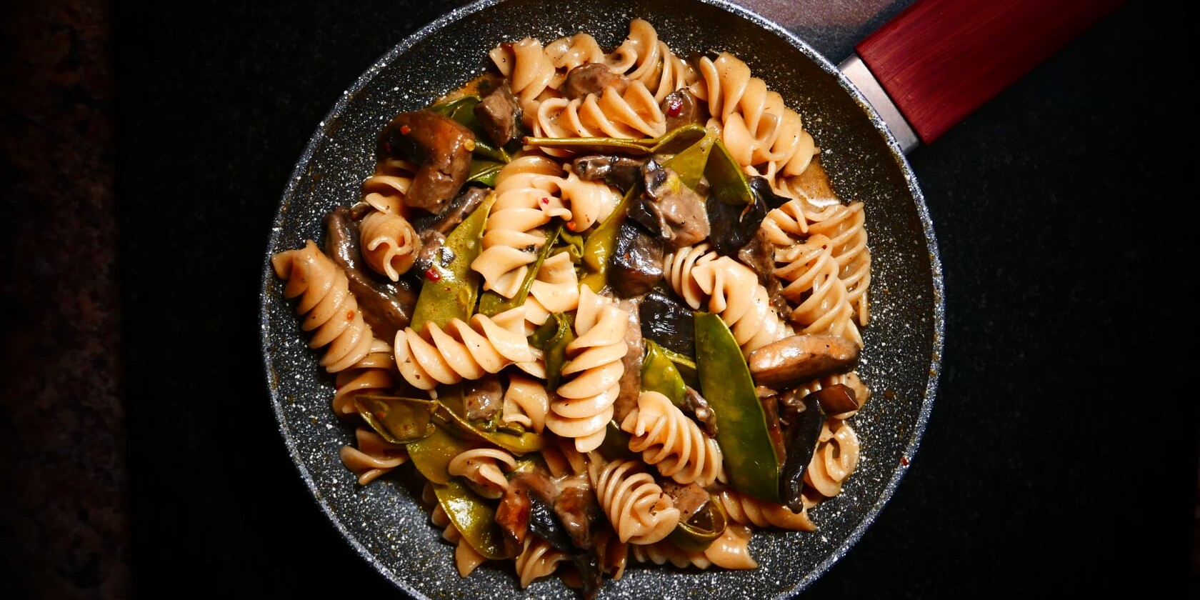 Fusilloni with Mushrooms & Mange Tout in Taleggio Cream